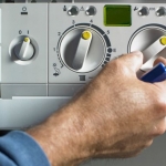 customer-service-man-fixing-boiler-pic-getty-images-915401668